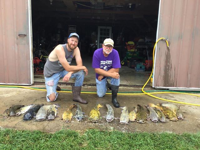Two Men Posing for Catfishing Catching Memories